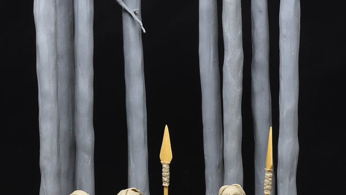Group of sculpted dwarves holding weapons, standing in front of a tall tree, dark background with text
