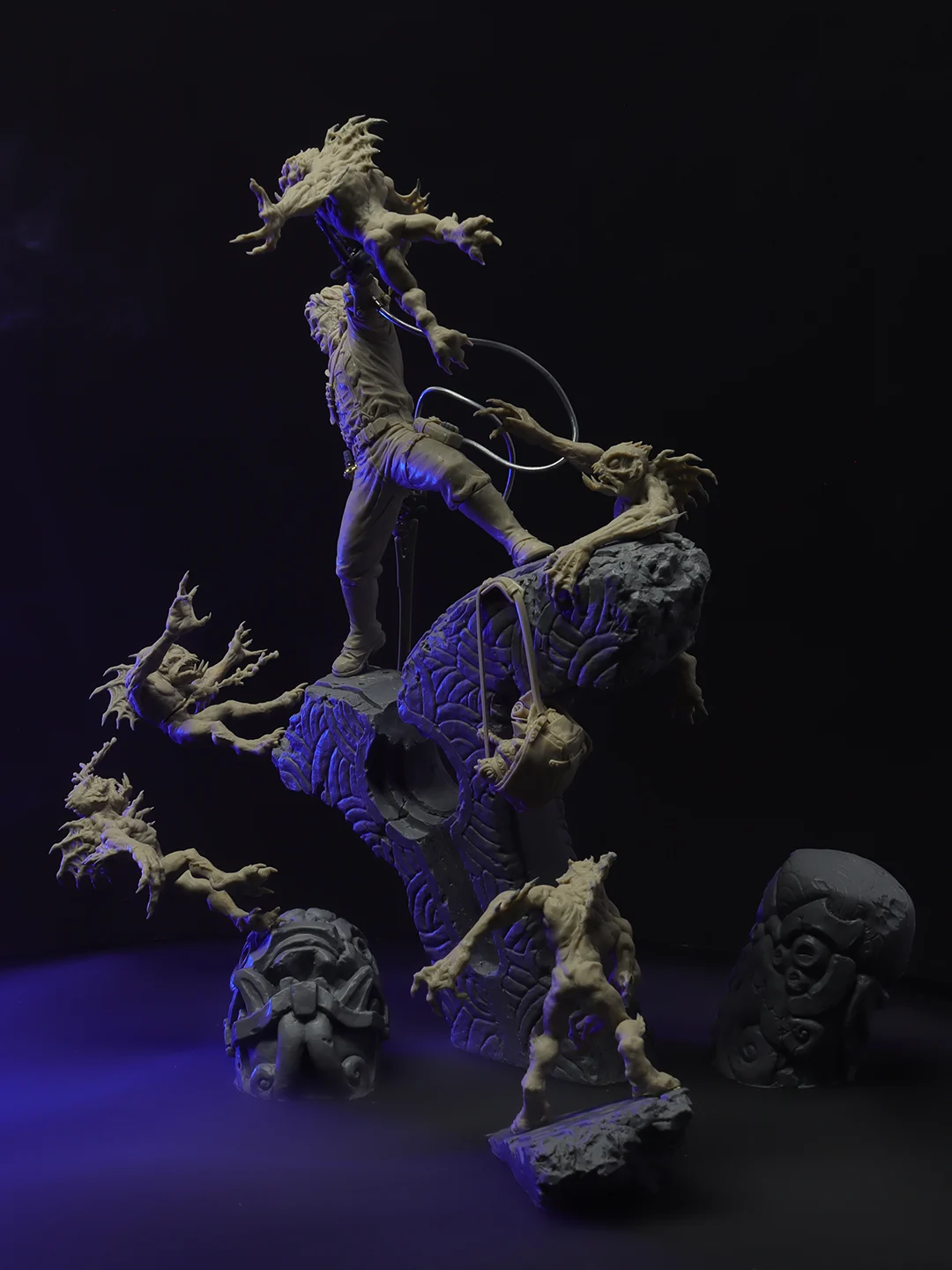 Group of people standing on rocky terrain with outstretched arms, appearing distressed against a dark backdrop