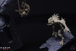 Close-up of a detailed dragon sculpture with spread wings, open mouth, bright yellow eyes