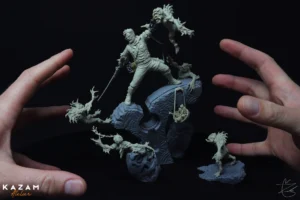 Person holding a sword, Kazam statue on rock in dark background